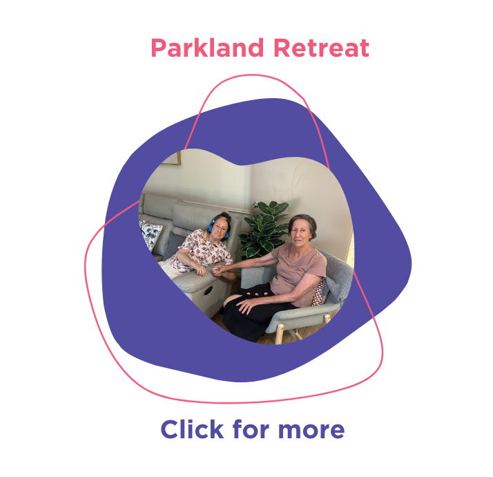 Rocky Bay Guest House Parkland Retreat. This graphic includes a photo of a parkland customer relaxing with her head phones on and holding hands with her support worker. 