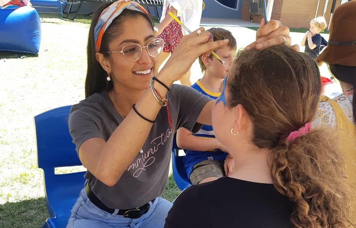 Jasmeet volunteering as a face painter at a local Geraldton community event