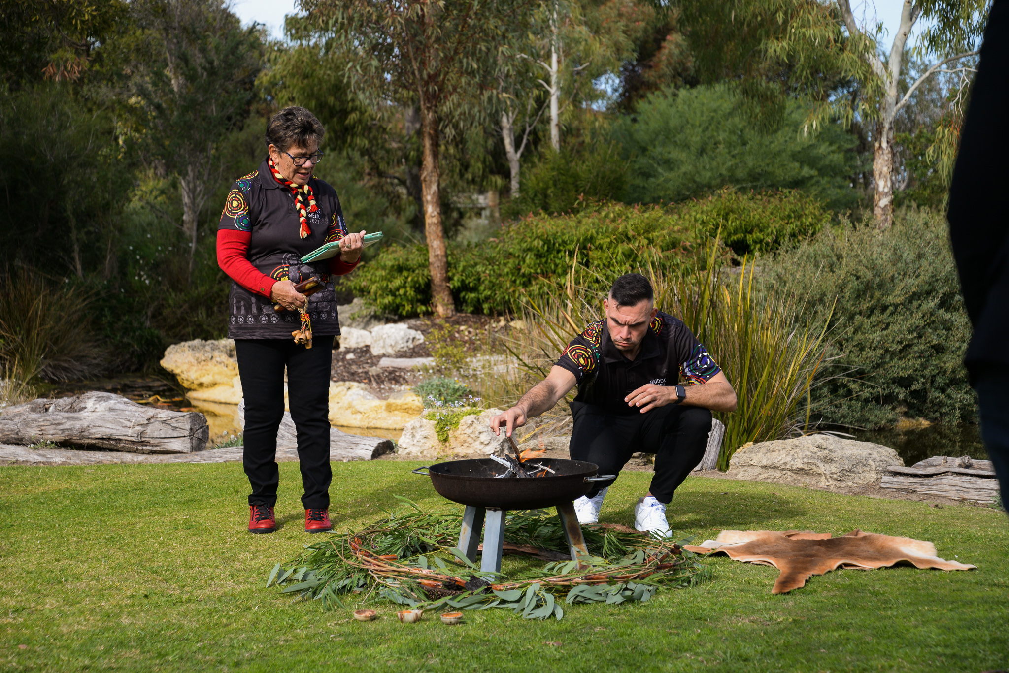 Robyn Collard and Toby leading the Welcome to Country and smoking ceremony for NAIDOC Week