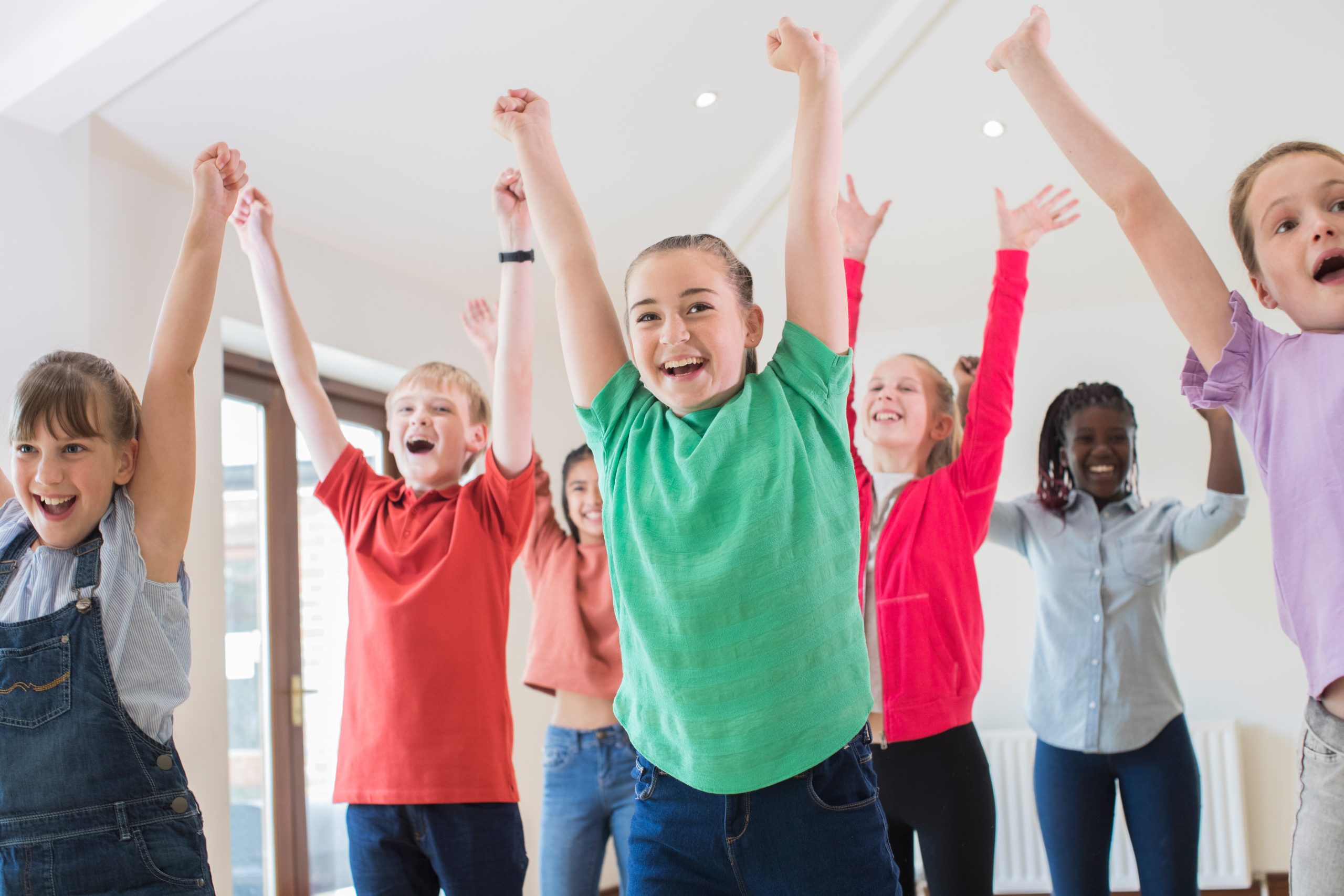 A group of primary school aged children having fun