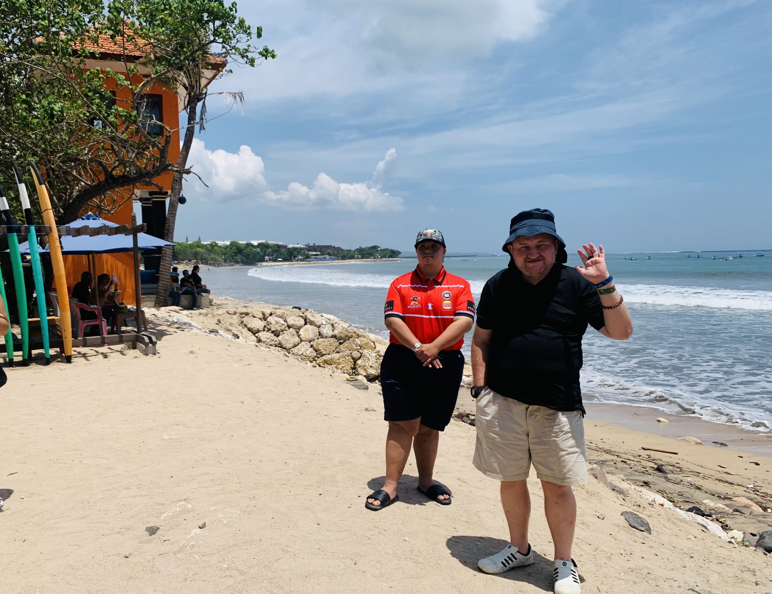 Photo of Jason and Fenton standing on a Bali beach