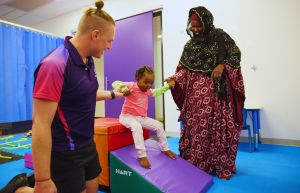 Young Rocky Bay customer receiving therapy at our Joondalup hub. Her mum is there with her.